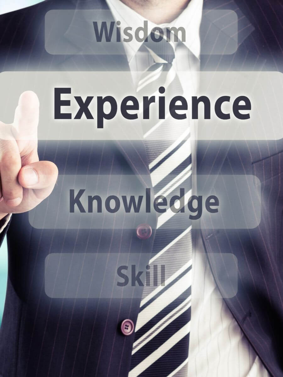 Businessman pressing experience button. Experience concept, toned photo.